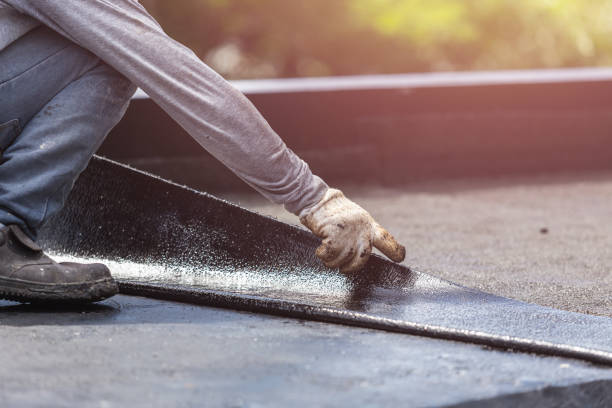 Professional Waterproofing technician working in Keego Harbor, MI